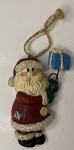 Adorno de Navidad de resina de Papá Noel vintage con globo de regalo - Imagen 1 de 2