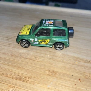 BURAGO 1/43 SUZUKI VITARA RAID 4112 DIE CAST CAR COLLECTION MODEL Green Rally - Picture 1 of 5