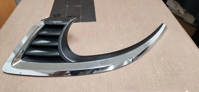 2006-2009 Saab 9-5 headlight driver side (LH) chrome trim OEM#: 12756073 - Image 1 of 4