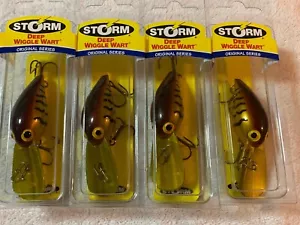 (LOT OF 4) STORM DEEP WIGGLE WART 7/16oz. GREEN CRAWDAD NIP - Picture 1 of 4