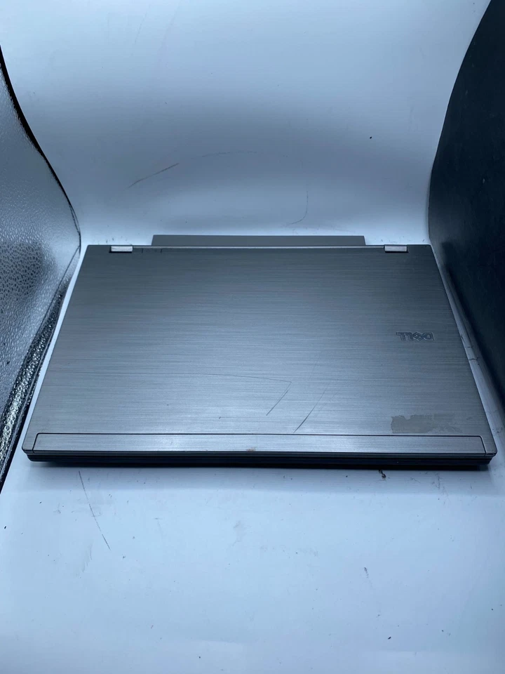 FOR PARTS -Dell Latitude E4310 13.3" i5-580M Dual Core 2.67GHz 4GB RAM 128GB SSD - image 1 of 4