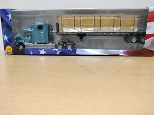 Trasporto legno Mack Vision n. 67. Camion americani - Foto 1 di 4