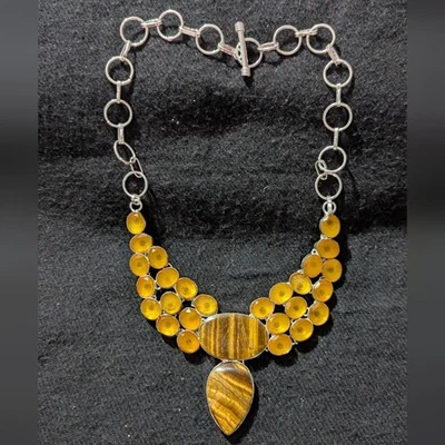 Collar plateado con piedras preciosas de zafiro amarillo ojo de tigre marrón Foto 1 de 4