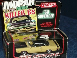 ROAD CHAMPS 1969 DODGE SUPERBEE AMARILLO/NEGRO con VITRINA ¡Escala 1/43 O MOPAR! - Imagen 1 de 12