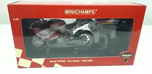 1/12 DUCATI 999F06 WSB 2006 World Champion - Troy Bayliss - MINICHAMPS - Foto 1 di 6