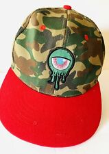 Carbon Elements Oozing Eye Camo trucker style hat with snap back