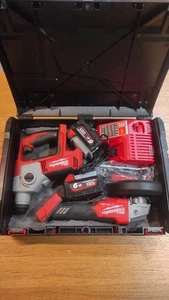 Milwaukee M18 FUEL Duo Kit Attrezzi Completo Di Batterie Caricabatterie Valigia - Picture 1 of 6