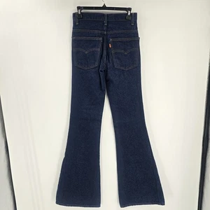 Jeans vintage Levis 684 0217 arancione linguetta hippie fondo a campana super svasati scuri anni 80 28x36 - Foto 1 di 8