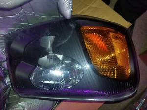 2016 gmc envoy passenger headlight assembly - Picture 1 of 4