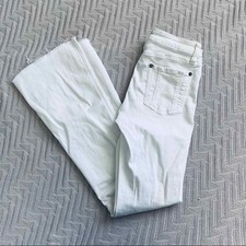 Alice + Olivia white distressed jeans