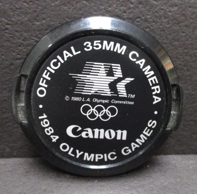 1984 Canon Olympic Games 52mm lens cover mint minus condition - Image 1 of 3