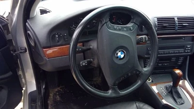 Columna de dirección negra BMW 528i con rueda, controles y resorte de reloj OEM Foto 1 de 4