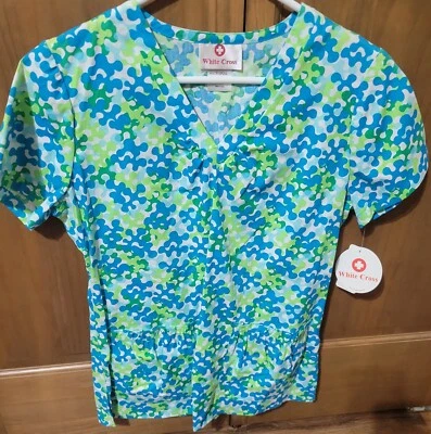 NWT - WHITE CROSS BRAND SCRUB TOP  W/BLUE & LIME GREEN PUZZLE PRINT IN SZ - XS - Image 1 of 4