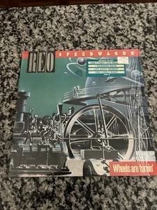 REO Speedwagon “Wheels are Turning” 1984 - Record & Jacket Nr. Mt. - Picture 1 of 9