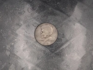 Struck Half Dollar: 1964 Kennedy Skull Liberty - Picture 1 of 4