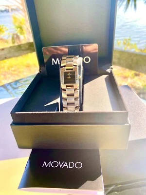 Reloj de cuarzo suizo con esfera de museo cara negra MOVADO ELIRO MANCHETTE para dama Foto 1 de 2