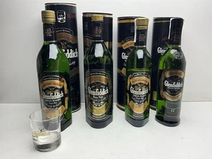 LOTE DE 4 BOTELLAS WHISKY HIGHLAND MALTA GLENFIDDICH-DIFERENTES ÉPOCAS Y MODELOS - Imagen 1 de 12