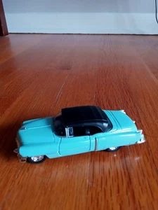 Welly 1953 Cadillac Eldorado Druckguss türkis schwarz Türen öffnen 4" - Bild 1 von 7