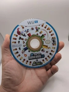 New Super Mario Bros. U + New Super Luigi U Nintendo Wii U For Parts/Not Working - Picture 1 of 3