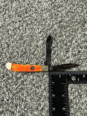 Cuchillo de bolsillo naranja para cubiertos cola blanca 2 hojas 2,5"" Foto 1 de 4