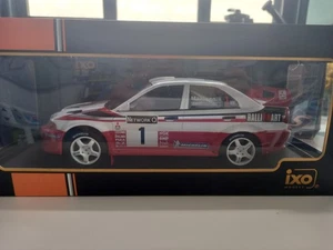 Mitsubishi Lancer Evo V Rally Rac 1998 Makinen  Ixo 1/18 - Foto 1 di 3