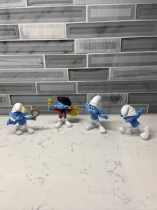 Lote de 4 figuras de juguete Pitufo McDonalds 2013 Pitufo de 3" juguetes para adornar pasteles. - Imagen 1 de 18