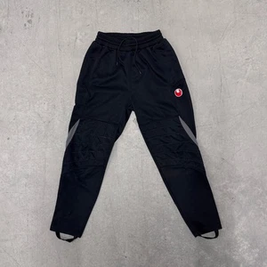 Pantalones de portero de fútbol acolchados Uhlsport medianos anatómicos joggers paintball - Imagen 1 de 7