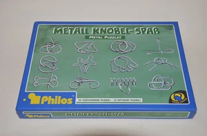 original PHILOS Metall-Knobel-Spaß: 12 Metal Puzzles für's Mental Training - Neu - Bild 1 von 2