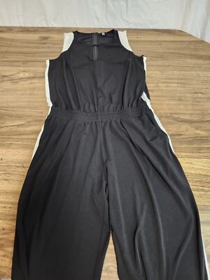 Mono negro con rayas blancas talla limitada talla limitada para mujer Foto 1 de 4