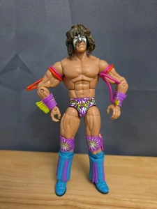 Figura de acción WWE Ultimate Warrior Mattel Elite 2011 Salón de la Fama dañada - Imagen 1 de 4