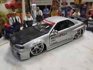 Nissan Skyline GTR R34 Moto Rex Jada Toys Import Racer 1:24 Scale Rare Silver - Imagen 1 de 12