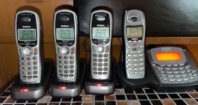 Uniden TRU8866 5.8 GHz 2 Line Cordless Phone Base & handset, 3 TCX 905 handsets - Image 1 of 4
