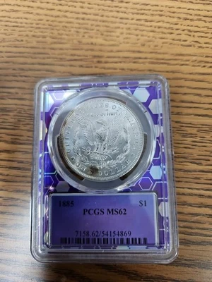 1885 P Morgan Silver Dollar PCGS MS62  Traderbea Purple Core. - Image 1 of 3
