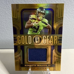 2023 PANINI GOLD STANDARD KENNETH WALKER III GOLD GEAR JERSEY /299