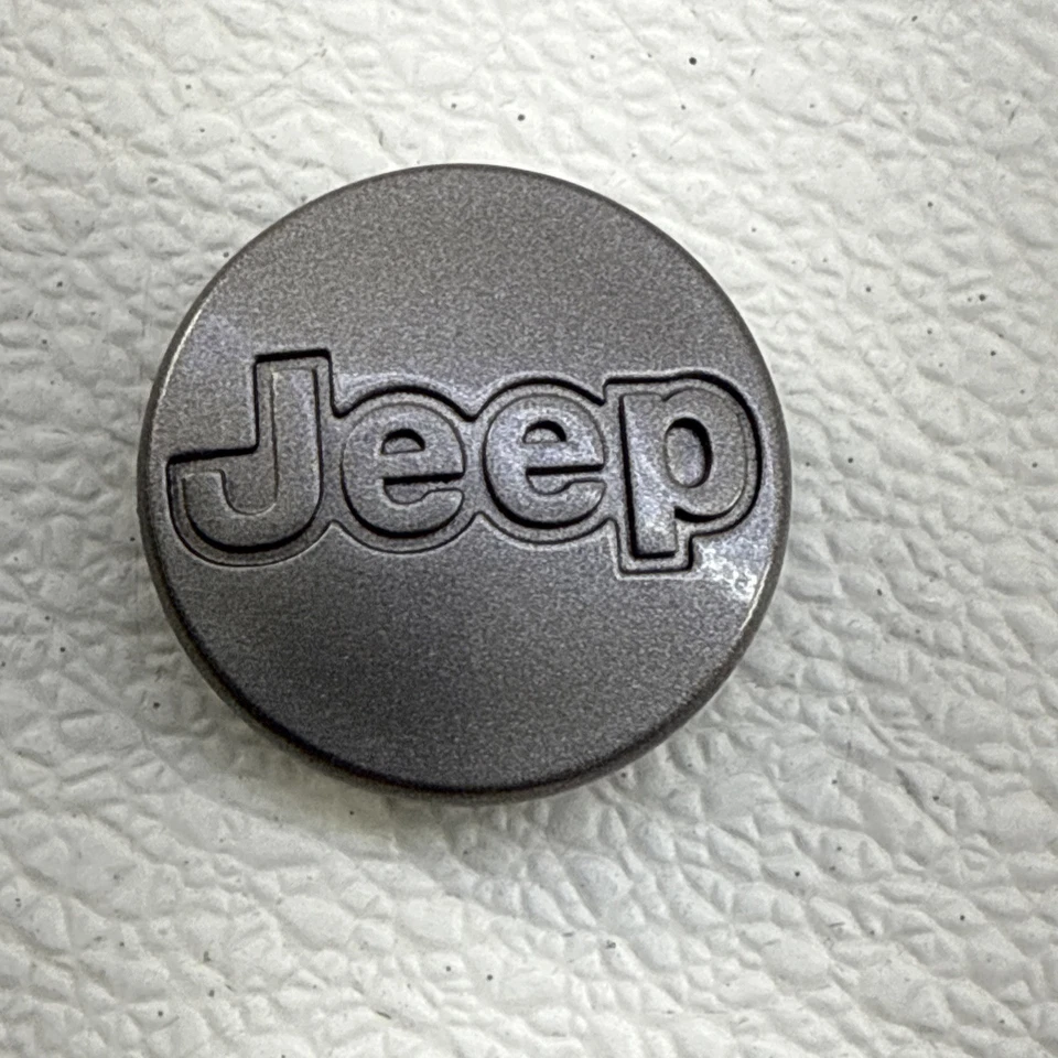 Tapacubos gris OEM 1997-2001 Jeep Cherokee XJ Wrangler llanta (1) Foto 1 de 4