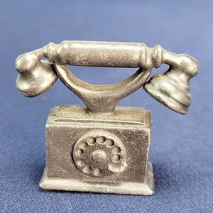 Estatuilla decorativa de muebles giratorios de peltre en miniatura vintage - Imagen 1 de 4