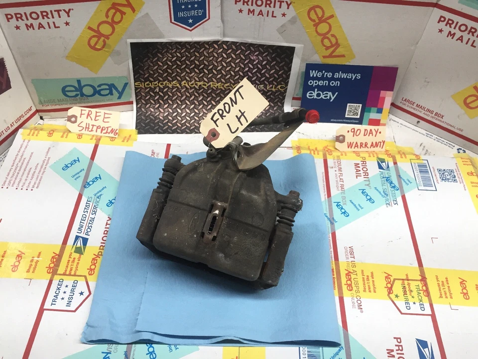 Pinza de freno delantera izquierda Ford Taurus Sho 1996 1997 1998 1999 completa OE Foto 1 de 4