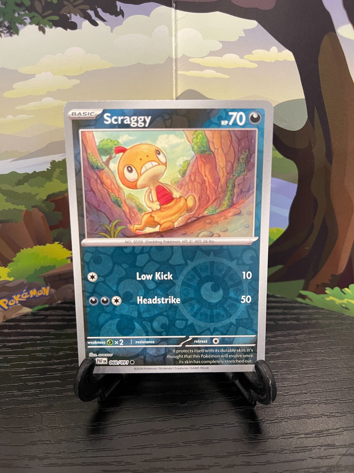Scraggy 060/091 - Paldean Fates - Common - Reverse Holo - Pokemon Card TCG - LP