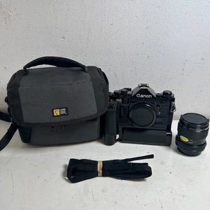 Canon A-1 Black 35mm Focal-Plane Shutter SLR Film Camera with FD Lens Mount - Picture 1 of 24