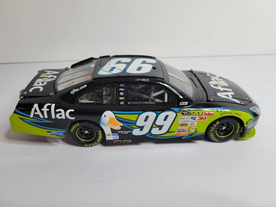 NASCAR- CARL EDWARDS # 99 AFLAC 2009 Fusion 1/24 - MISSING SPOILER READ - Image 1 of 4