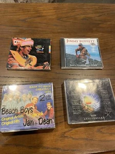 Lot Of 4 CDs BEACH BOYS AND JAN AND DEAN Island Mix Jimmy Buffet 1389 - Picture 1 of 11