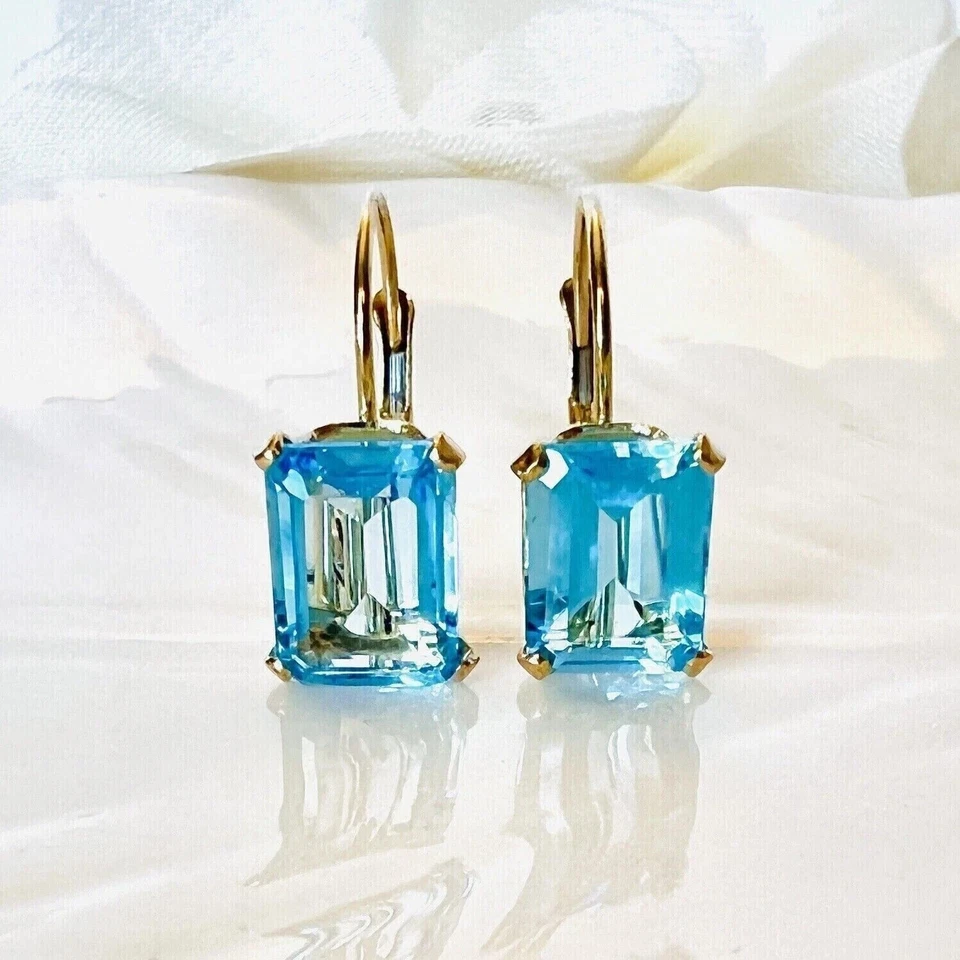 Pendiente aro colgante topacio azul simulado corte esmeralda de 3,00 quilates enchapado en oro amarillo de 14 quilates Foto 1 de 4