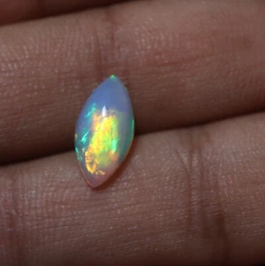 Cabujón marquesa ópalo etíope llamativo AAA natural de 1,7 quilates 13,7 x 7 mm - Imagen 1 de 9
