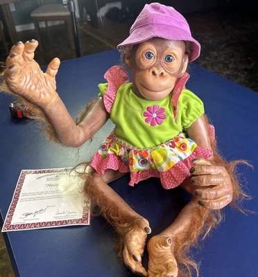Ashton Drake Galleries Realistic Baby Monkey Doll “Mollie” In A Sun Dress. - Image 1 of 4