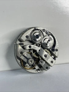 Movimiento de reloj de bolsillo pequeño vintage sin marca para piezas/reparación - Imagen 1 de 2