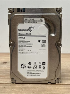 Seagate ST2000DX001 2TB 8GB 64GB SATA III 3,5" Desktop SSHD Hybrid Festplatte - Bild 1 von 3