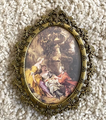 Arte de pared ovalado de bronce de latón ornamentado de acción de Italia de colección 6 1/2 x 4 3/4 pulgadas Foto 1 de 4