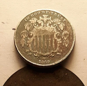 17) 1869 Shield Nickel (5c), VF-XF. Some rough surfaces. - Picture 1 of 2