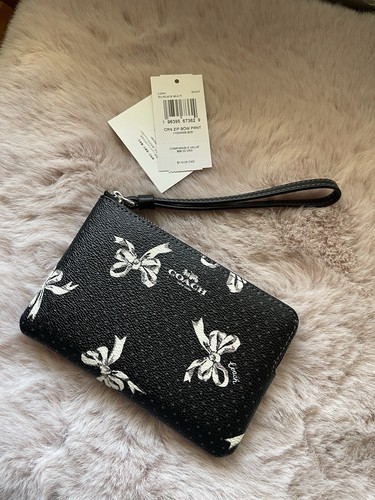 ? Polsino Coach con Zip Angolare CZ441 Tela Stampata Nera con Fiocchi Argento Nuovo con etichette
