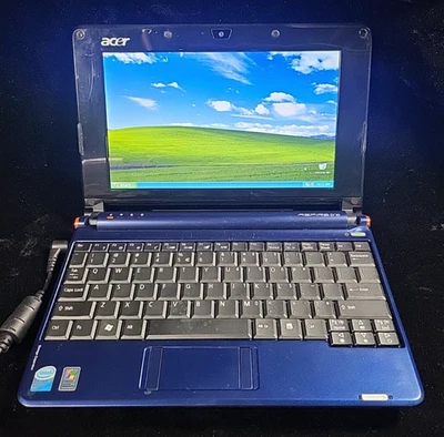 Acer Aspire One Series Model ZG5  & charger Laptop / Netbook - NEEDS NEW BATTERY - Image 1 of 4